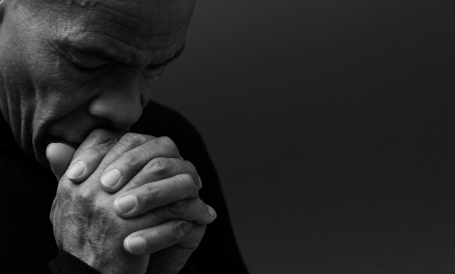 A pastor in prayer